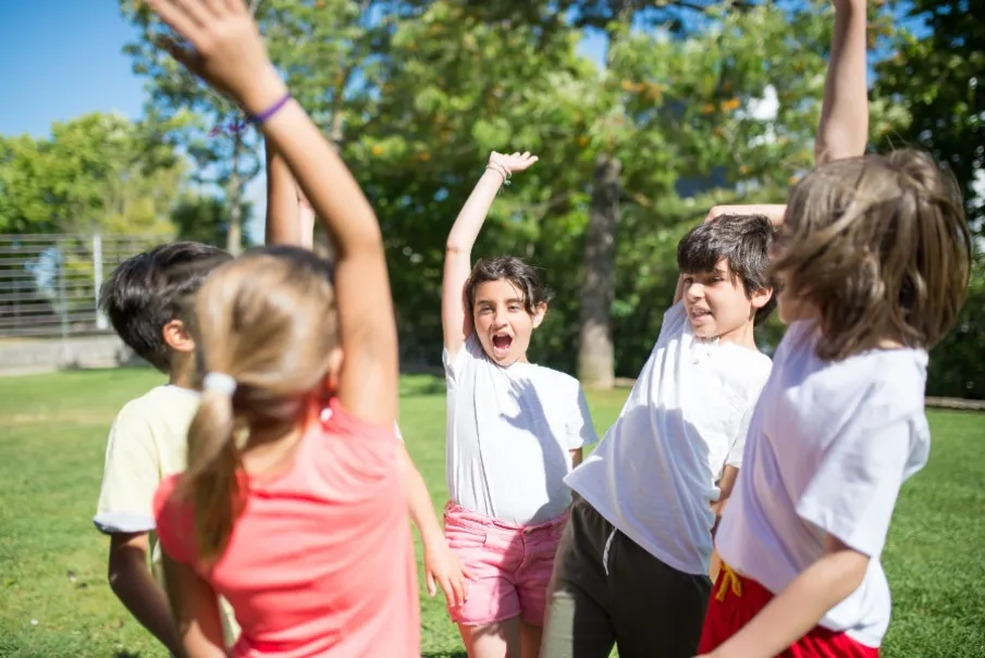 Children playing and having fun in a park